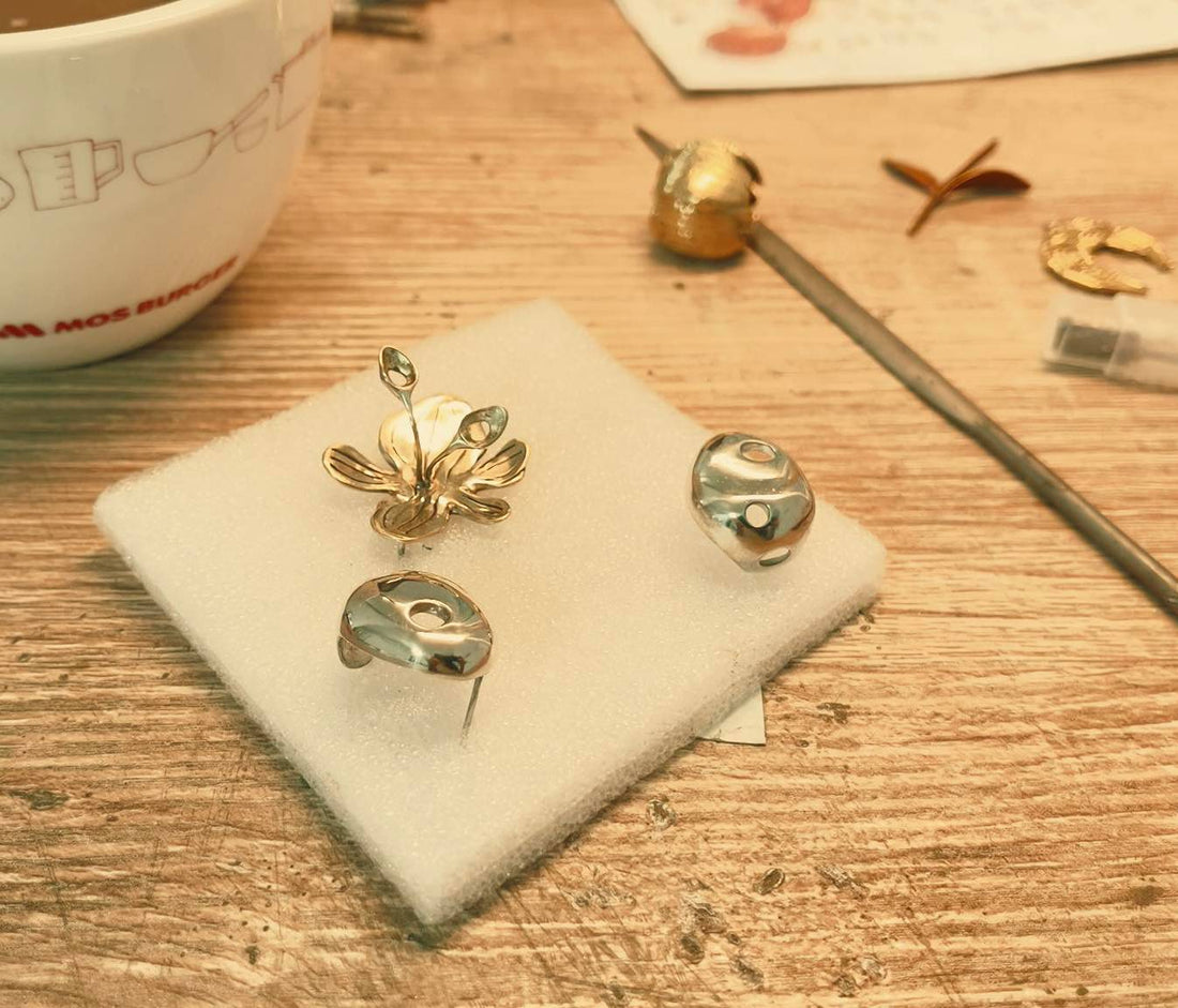 "Handmade botanical jewelry earrings and rings coffee break moment"