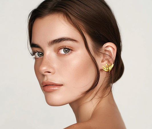 Leaf Cluster gold earrings - detailed product shot showing five-leaf cluster design for modern elegance | HELIGRAE 2026 Collection