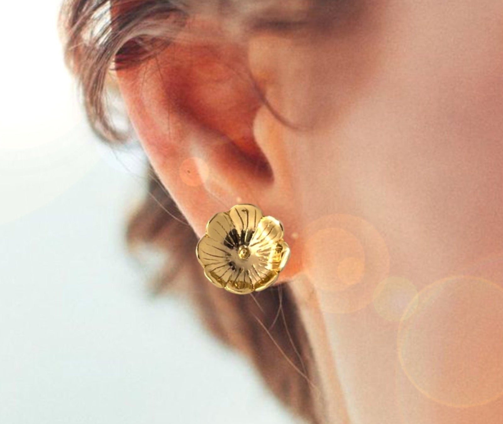 Morning Dew Bloom floral earrings in gold - lifestyle product photography on neutral background | HELIGRAE minimal jewelry