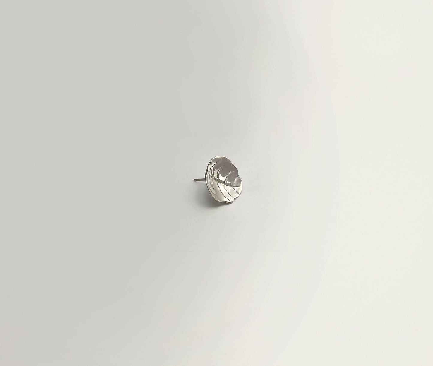 Minimalist Leaf silver earrings - close-up showing subtle leaf veins and folded form | HELIGRAE handcrafted jewelry