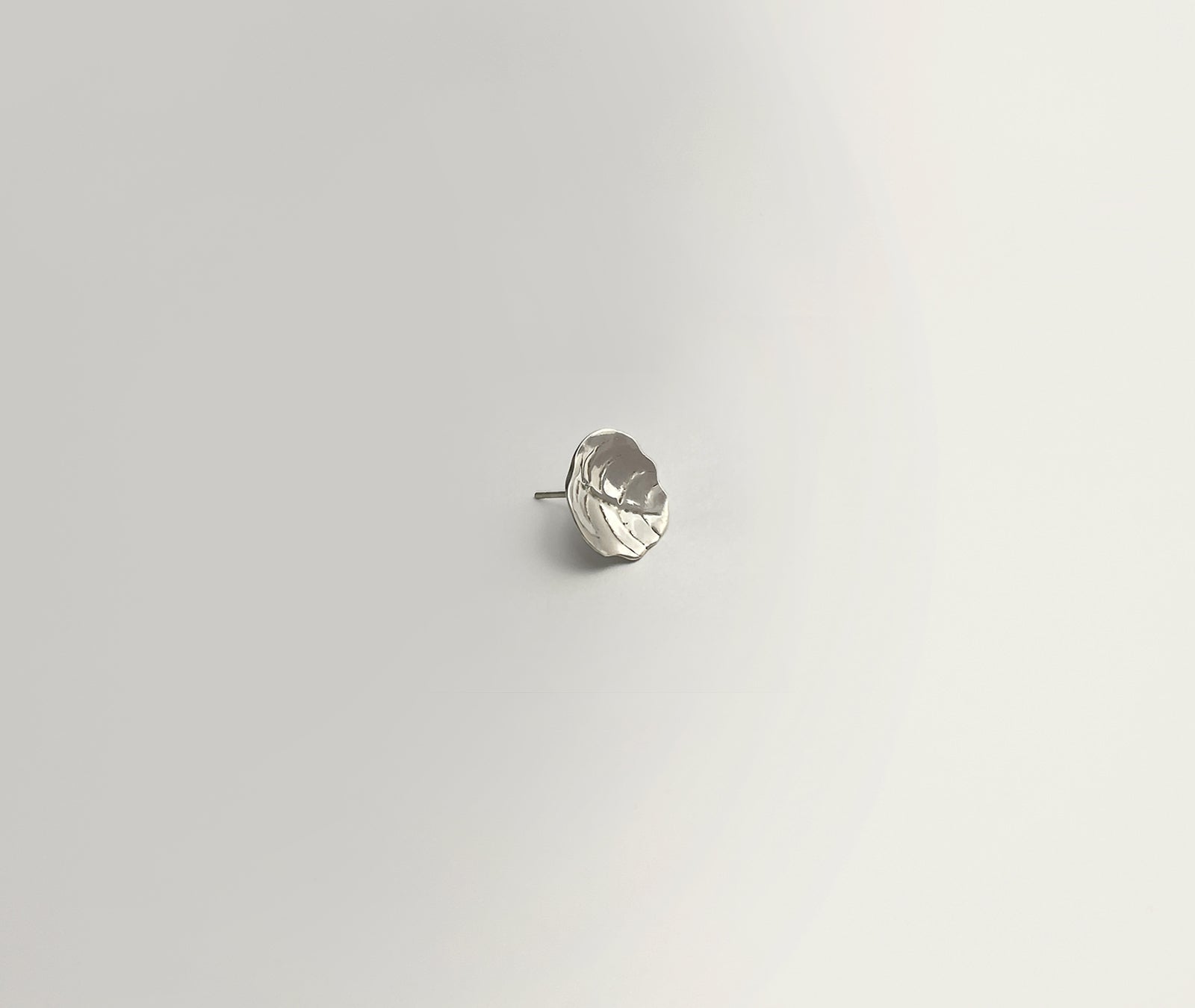 Minimalist Leaf silver earrings - close-up showing subtle leaf veins and folded form | HELIGRAE handcrafted jewelry