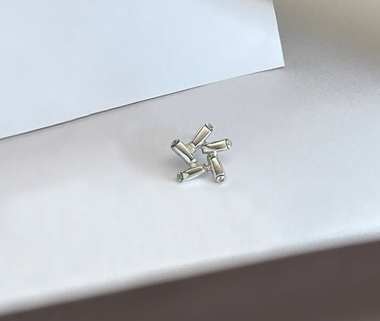 Nova Gleam geometric star earrings - product detail showing 5 cubic zirconia stones and faceted design | HELIGRAE Prototype No. 06
