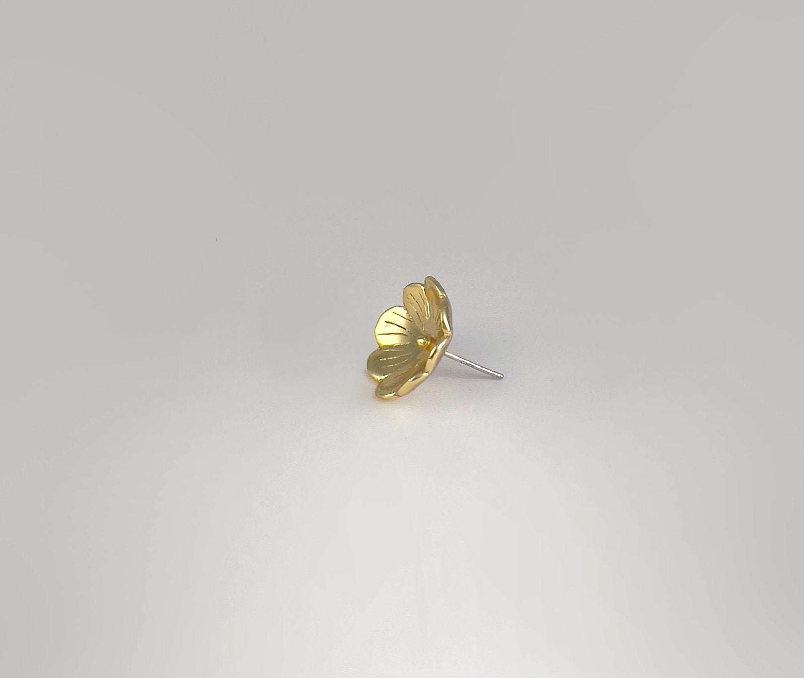 Morning Dew Bloom floral studs in gold - side angle highlighting layered petal structure and radiant finish | HELIGRAE 18K gold plated