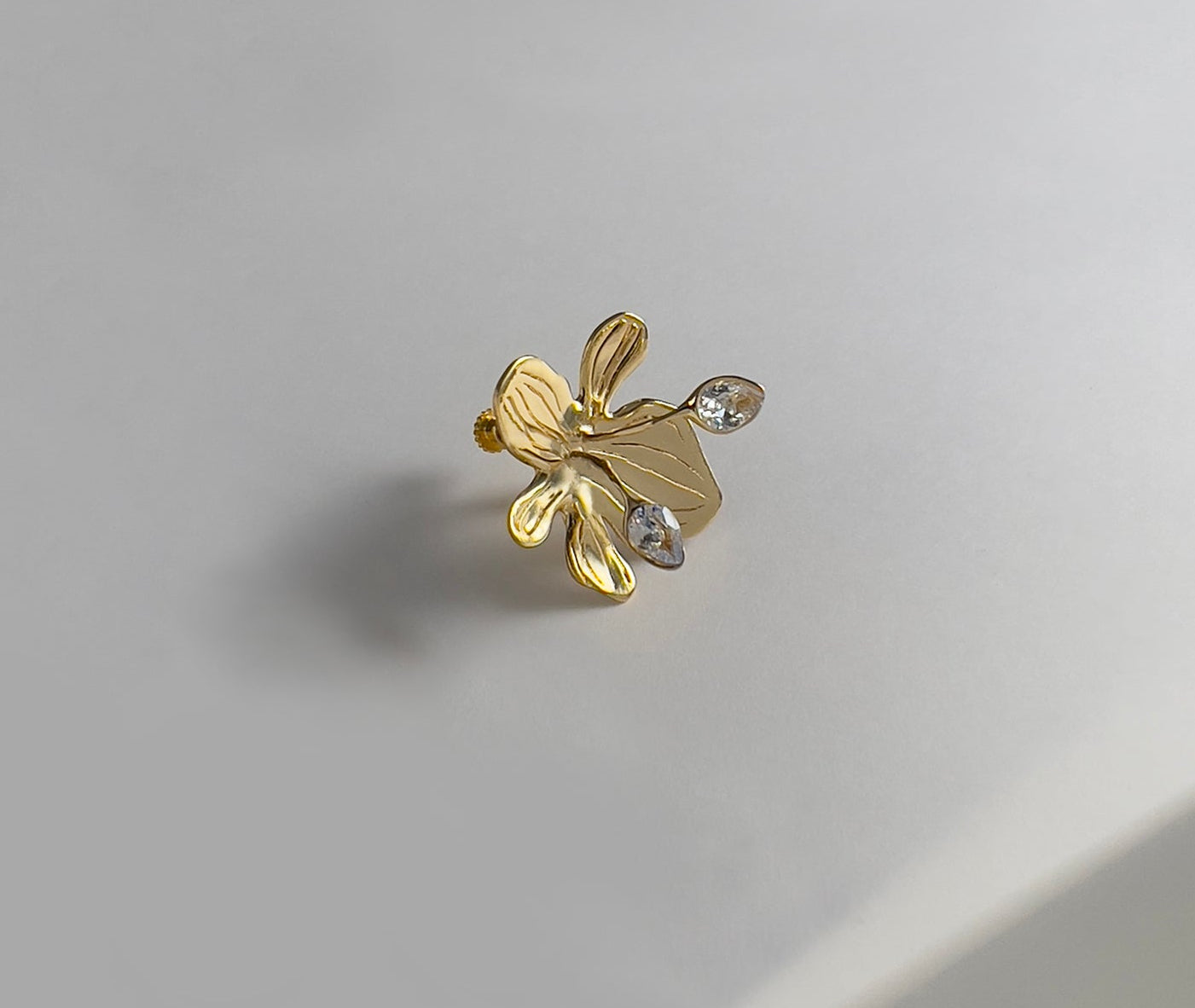 Orchid Bloom earrings in 18K gold plated brass - bold orchid design with teardrop zircon stones | HELIGRAE 2026 Collection No. 03