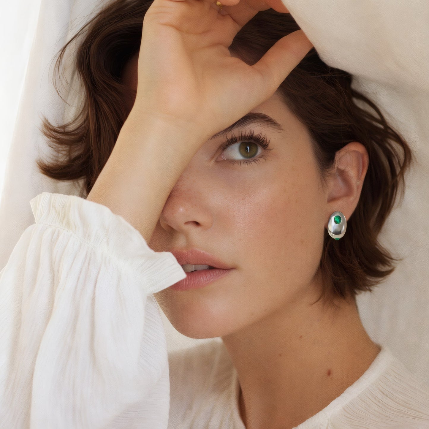 Minimal Pebble Stud Earrings with Colored Zirconia in 925 Sterling Silver worn on ear