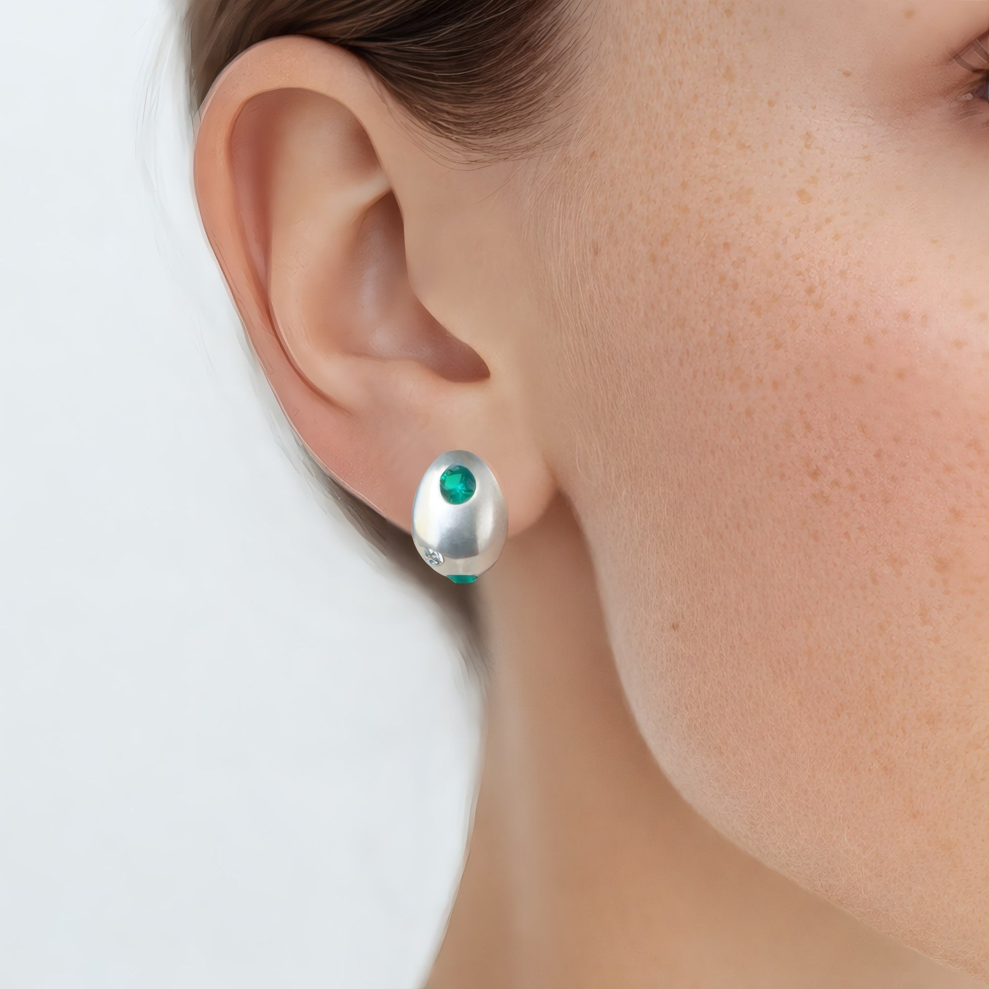 inimal Pebble Stud Earrings with Colored Zirconia side view on ear