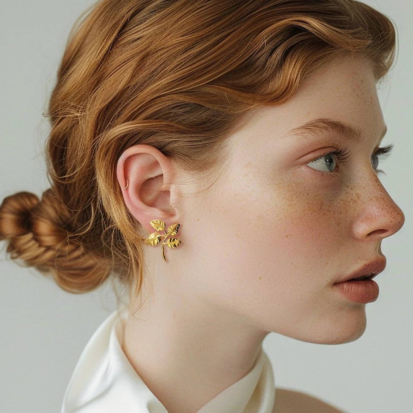 Minimal Four Leaf Cluster Earrings 18K gold plated brass model side profile wearing earrings