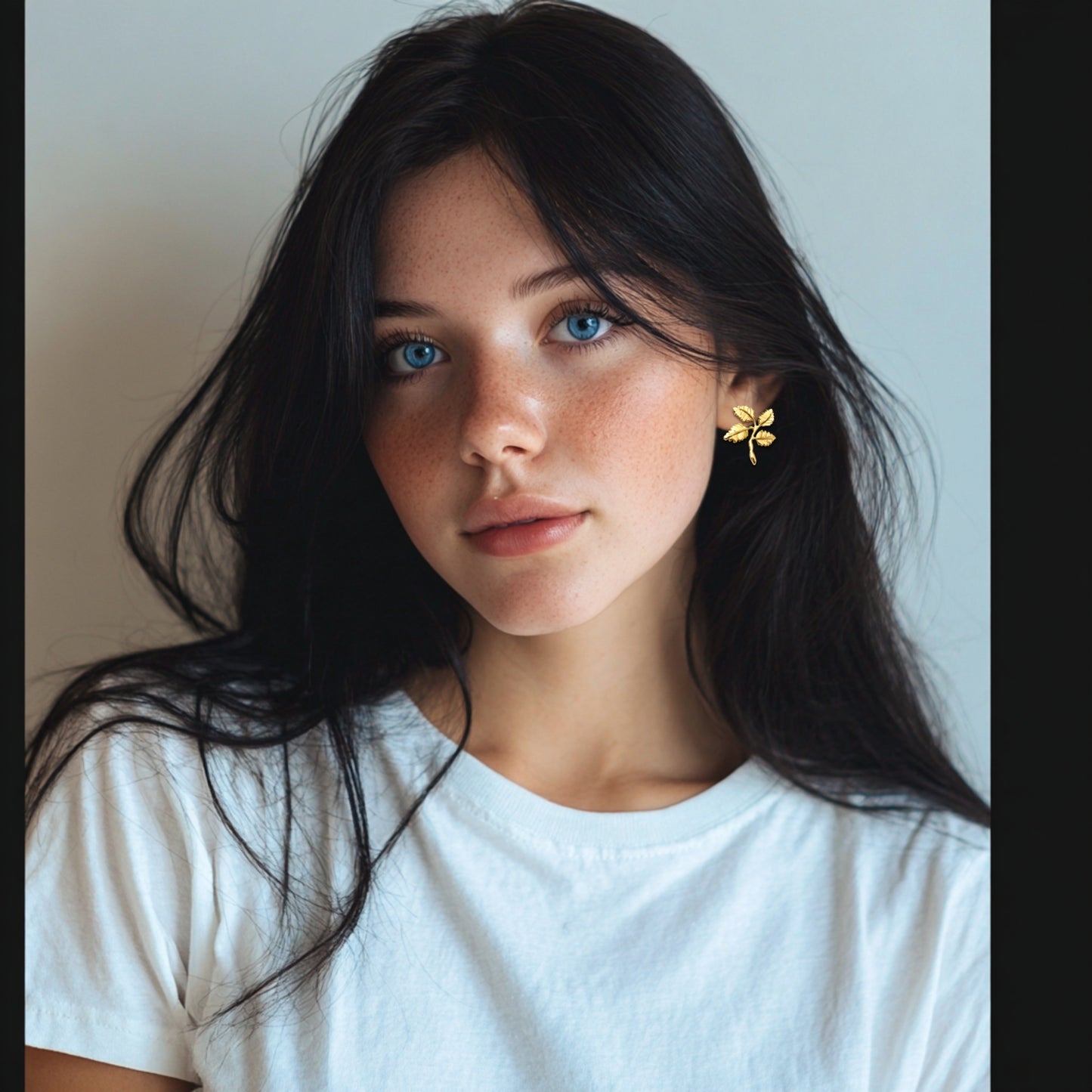 Minimal Four Leaf Cluster Earrings 18K gold plated brass botanical leaf stud earrings model front portrait
