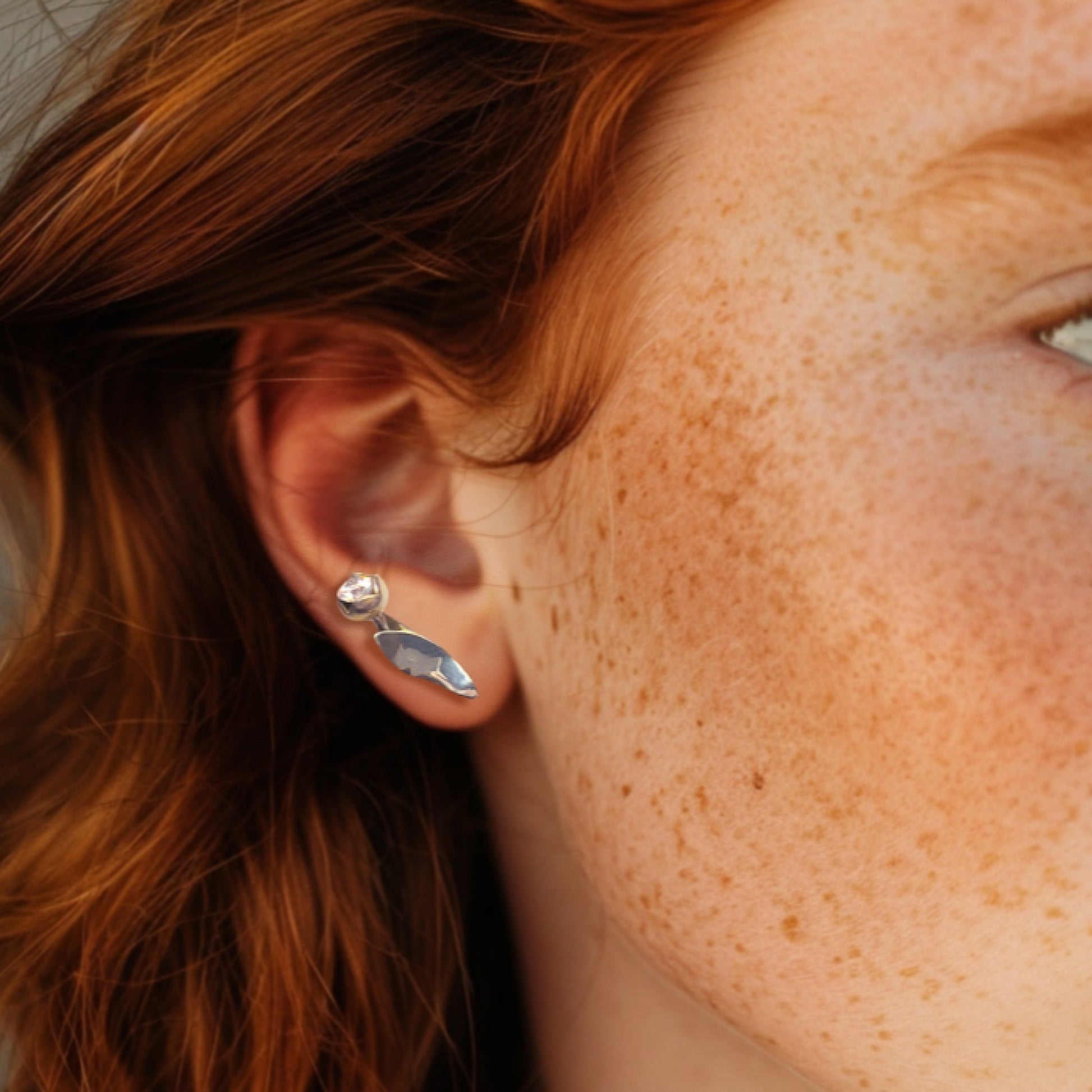 Tulip Bloom earrings in 925 silver - macro shot showing delicate petal details and gemstone setting | HELIGRAE botanical collection