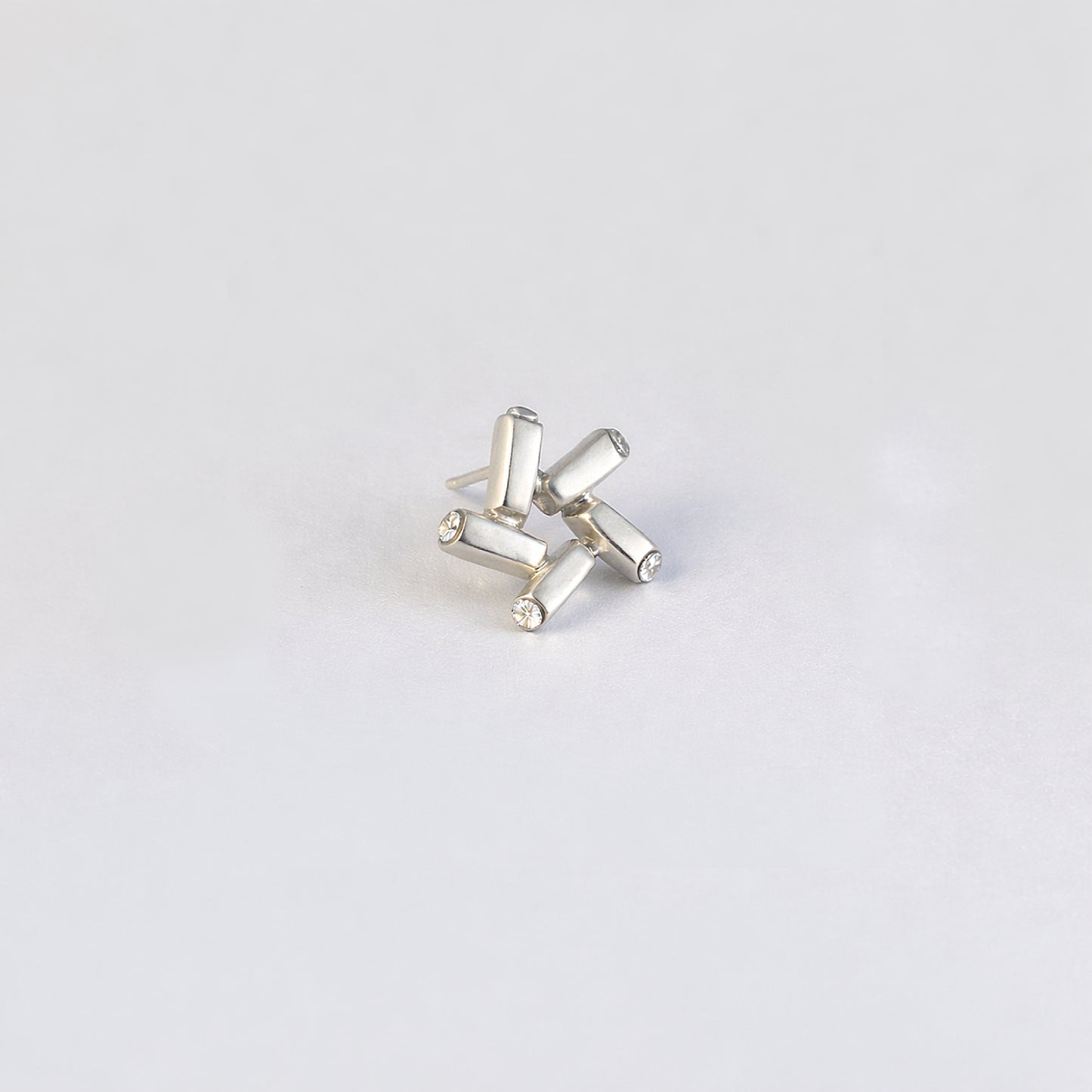 Nova Gleam star earrings in 925 sterling silver - front view highlighting radiant sparkle from every angle | HELIGRAE celestial jewelry