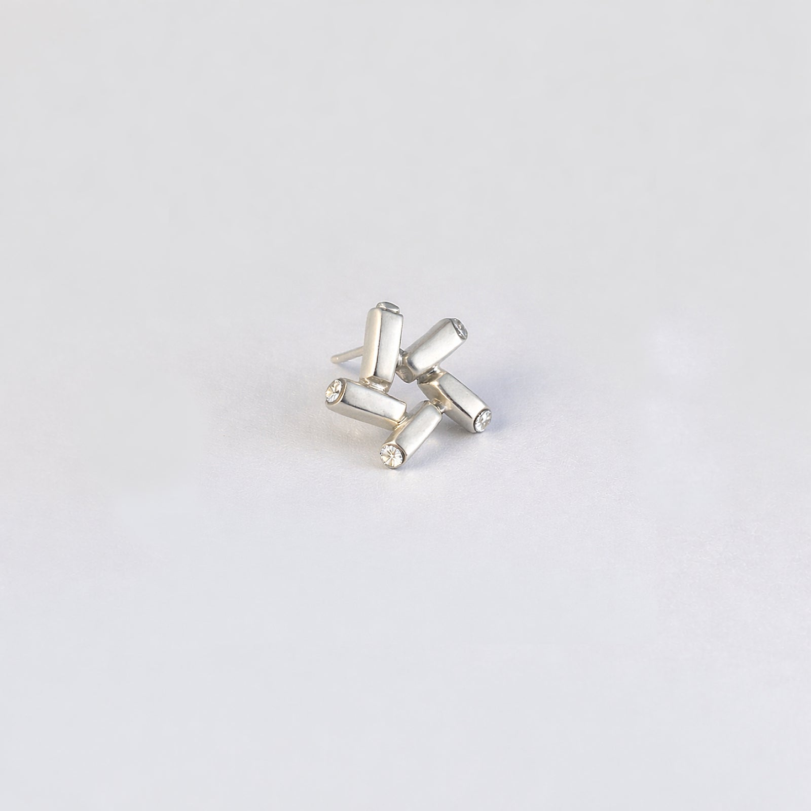 Nova Gleam star earrings in 925 sterling silver - front view highlighting radiant sparkle from every angle | HELIGRAE celestial jewelry